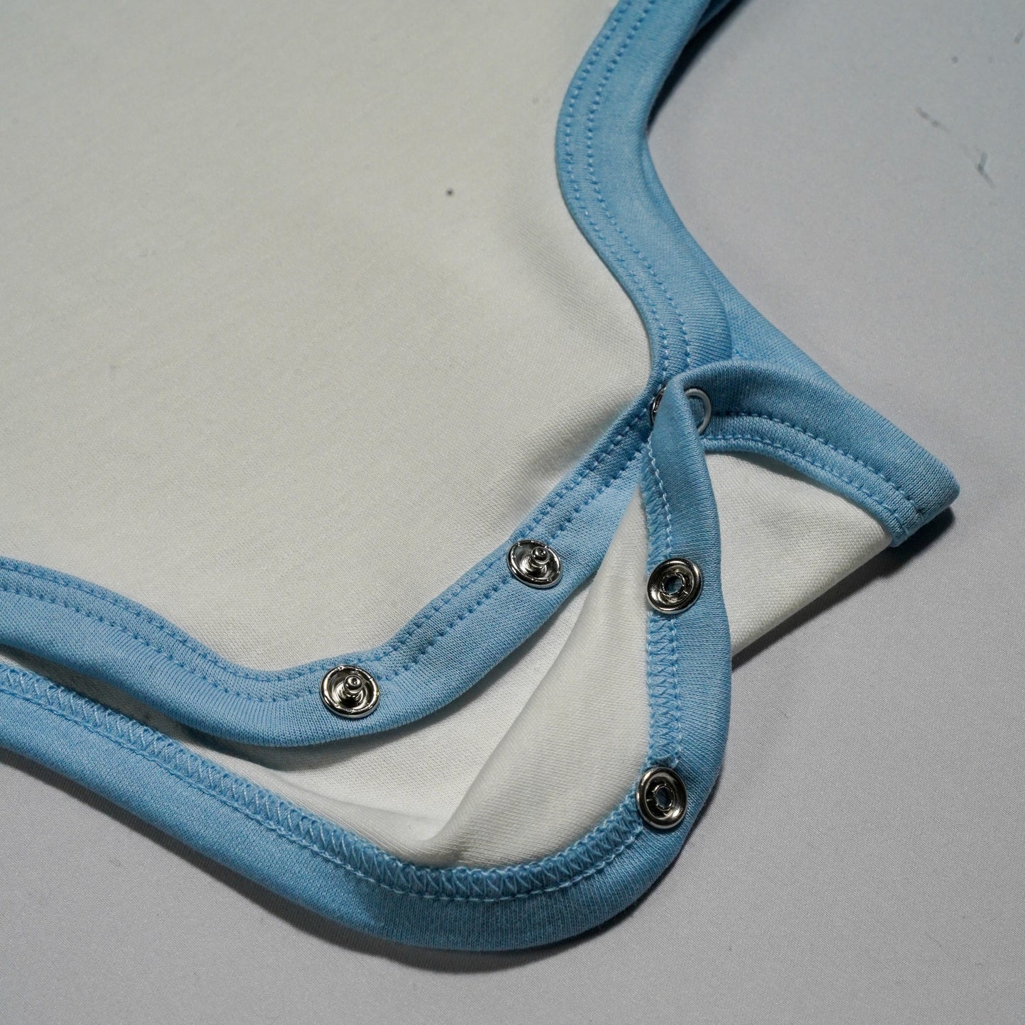 Long Sleeve Bodysuit in White with Chambray Blue